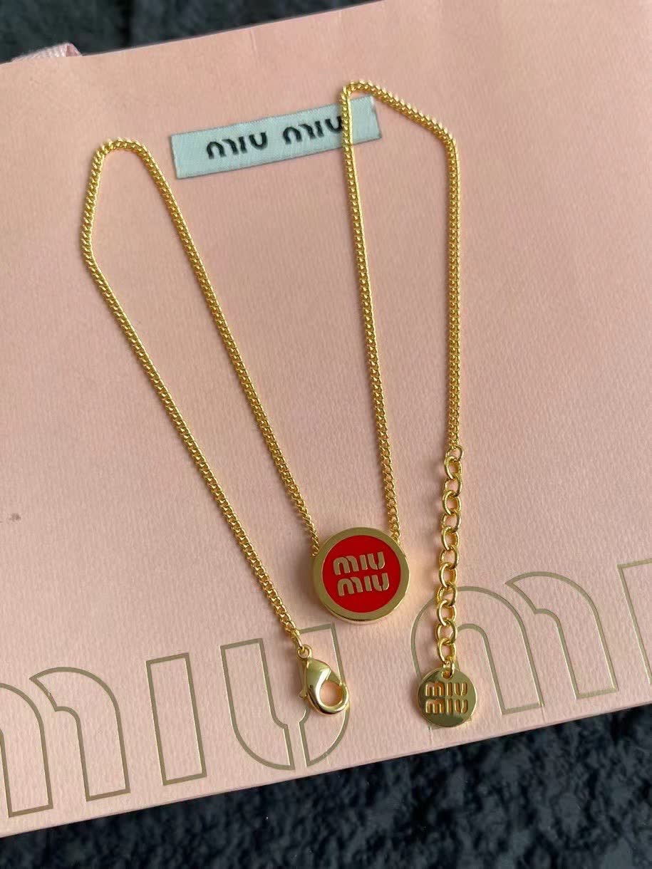 Miu Miu necklace with red circular pendant